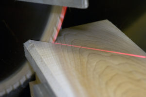 cutting wood along laser line